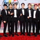 Image for article titled Statement Suits, Plush Pinks, and a Lotta Gowns on the American Music Awards Red Carpet